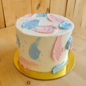 Gâteau gender reveal blanc, bleu et rose